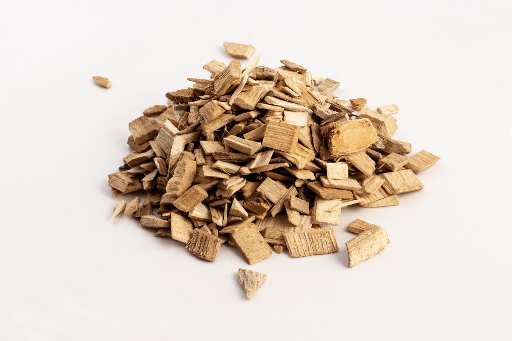 Pile of wood chips for smoking on a white background