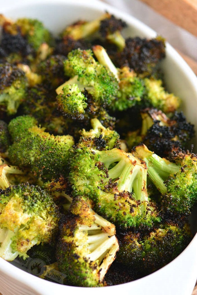 Grilled broccoli in a white bowl