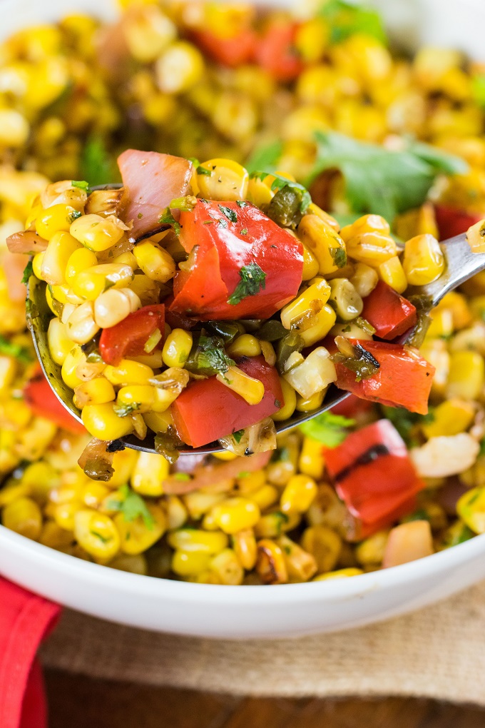 Southwest Corn Salad on a silter serving spoon