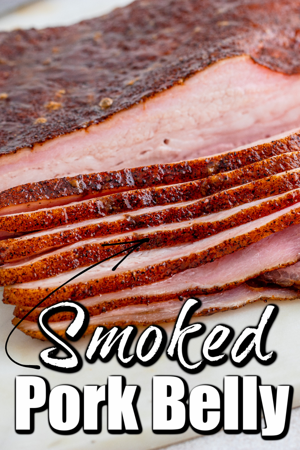 This Smoked Pork Belly is melt in your mouth fantastic! Cooking it low and slow...it is likely some of the best bacon you will ever have. 