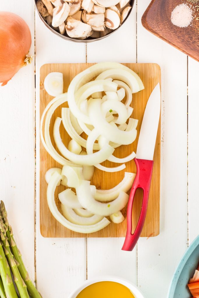 Cutting onions on a board