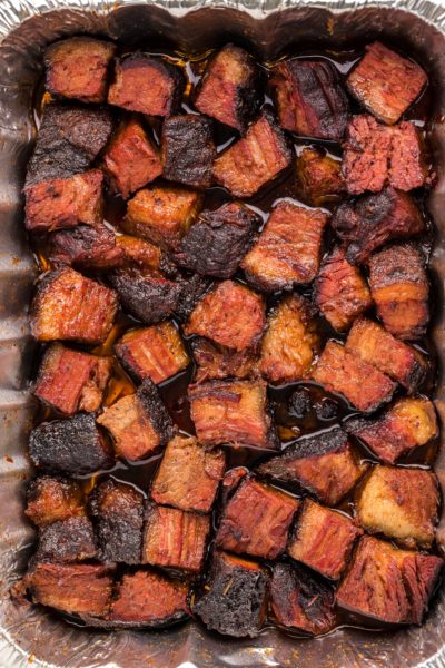 Smoked burnt ends in a foil pan
