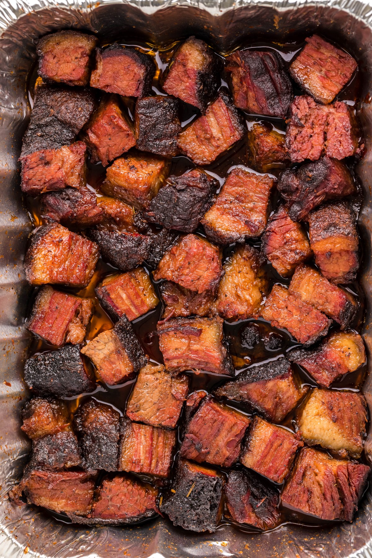 Foil pan of smoked burnt ends