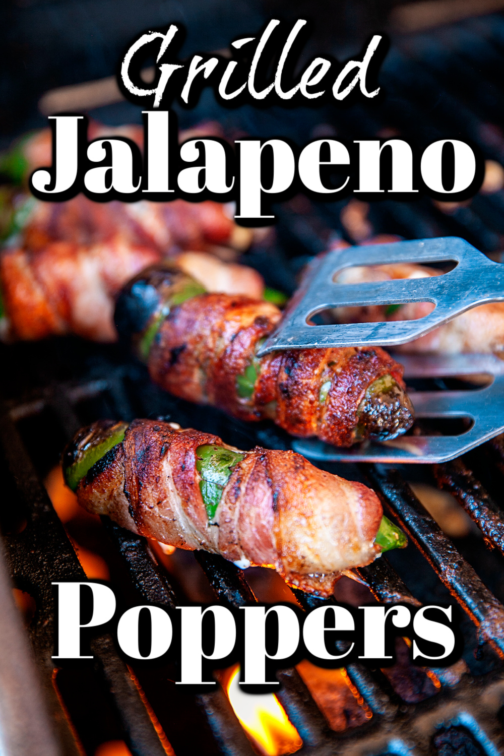 Grilled jalapeno poppers filled with cream cheese and wrapped in bacon! These little bites will disappear quickly; better make a double batch!