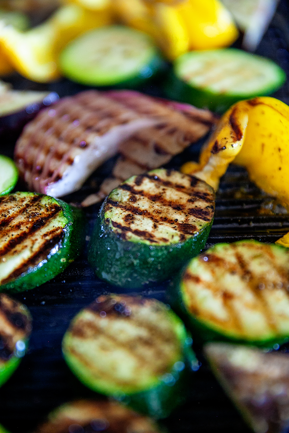 Cut vegetables cooking on the grill.